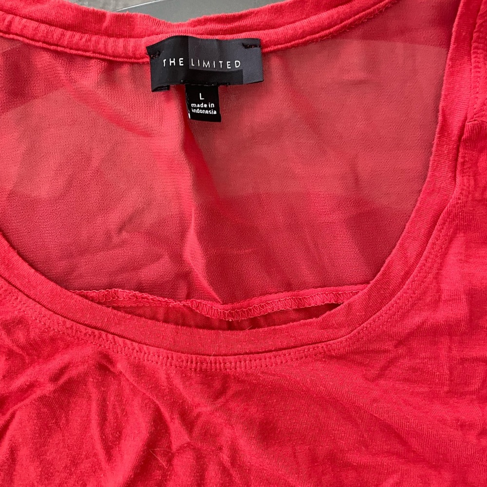 The limited, orange shirt, size L